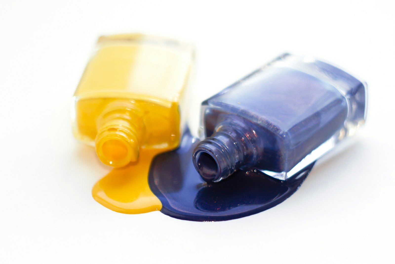 a bottle of yellow and blue nail polish: Nail Art Therapy
